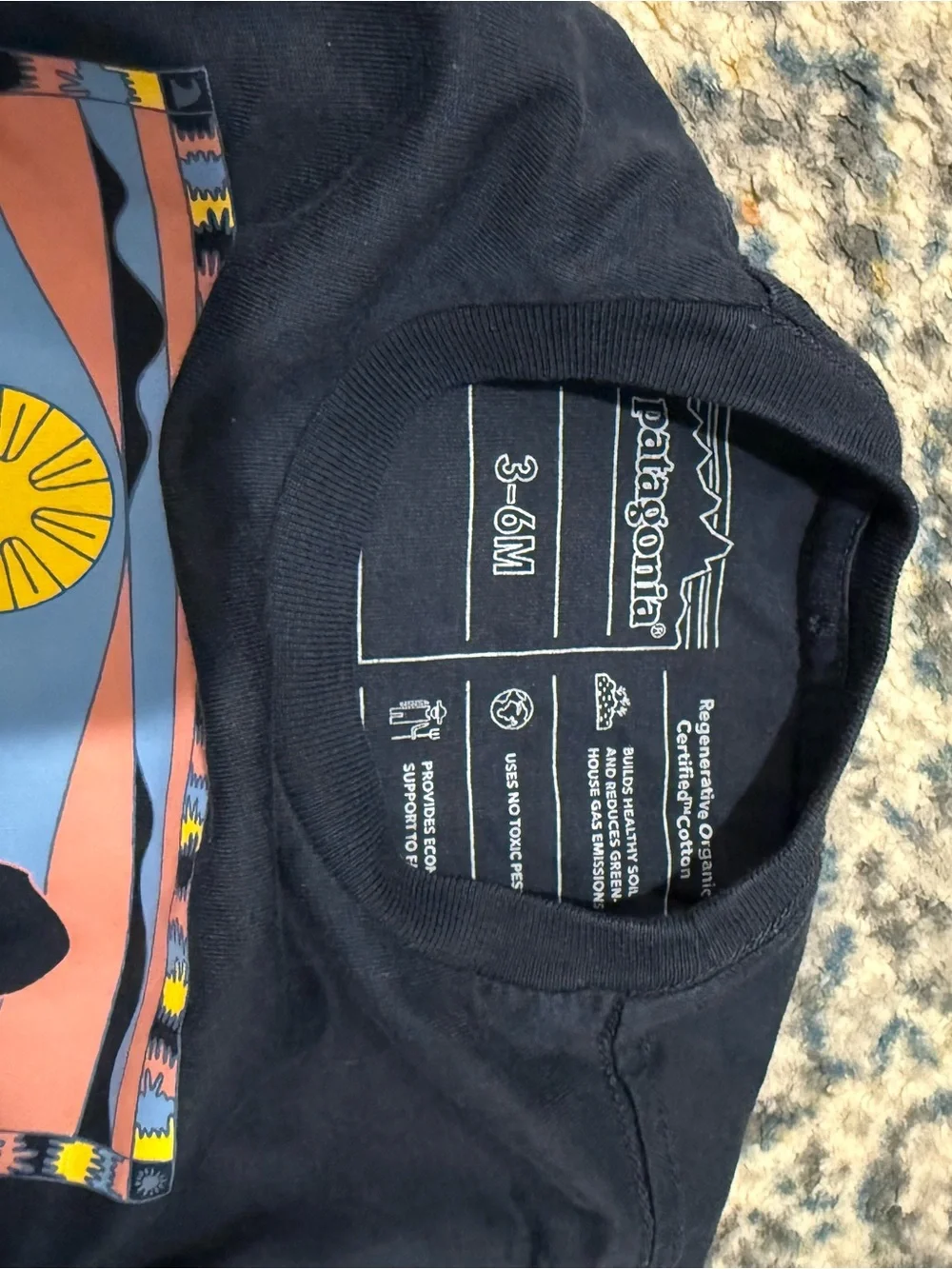 Patagonia Navy Short-Sleeve Tee with Sunset Ocean Graphic